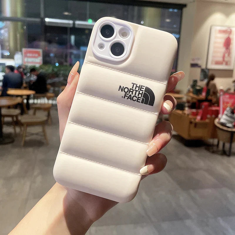 Experience the ultimate outdoor readiness with the north face puffer phone case
