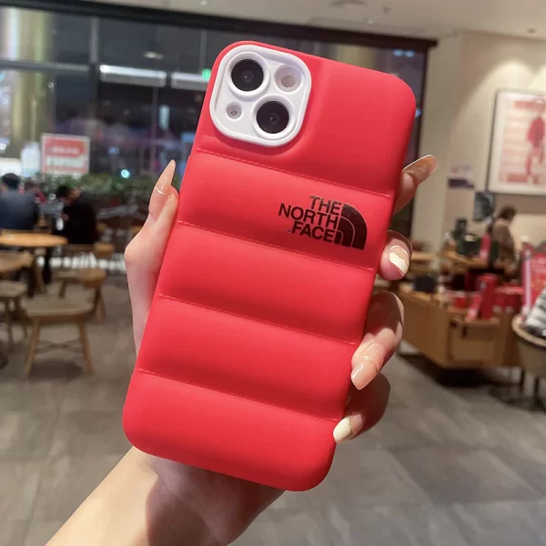 Elevate your phone's style and safeguard it with north face puffer phone case