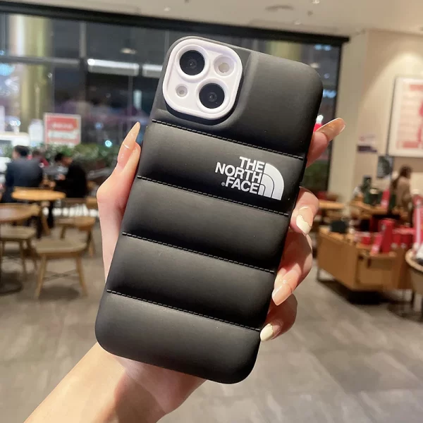 Elevate your device's aesthetics with the iconic with north face puffer phone case