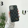 Detailed view of a Gucci GG phone case with card holder.