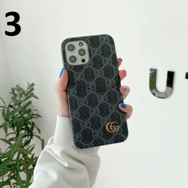 Detailed view of a Gucci GG phone case with card holder.